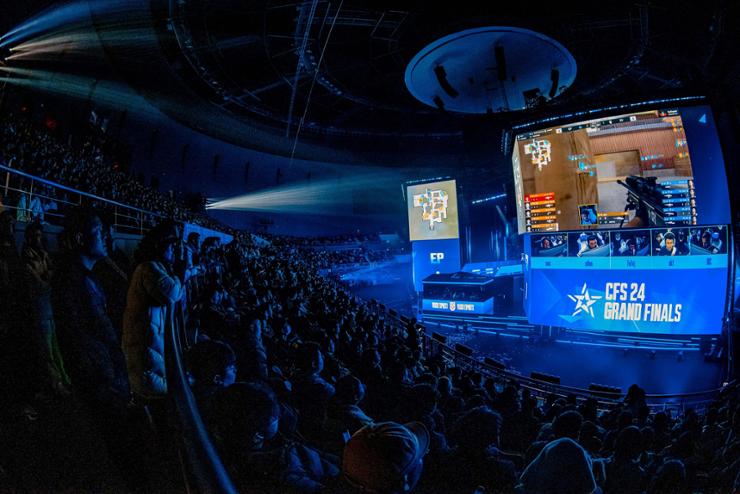 Audiences watch the live feed of the finals match of CrossFire Stars 2024 at the Hangzhou Canal Asian Games Park, China, Dec. 15. Courtesy of Smilegate